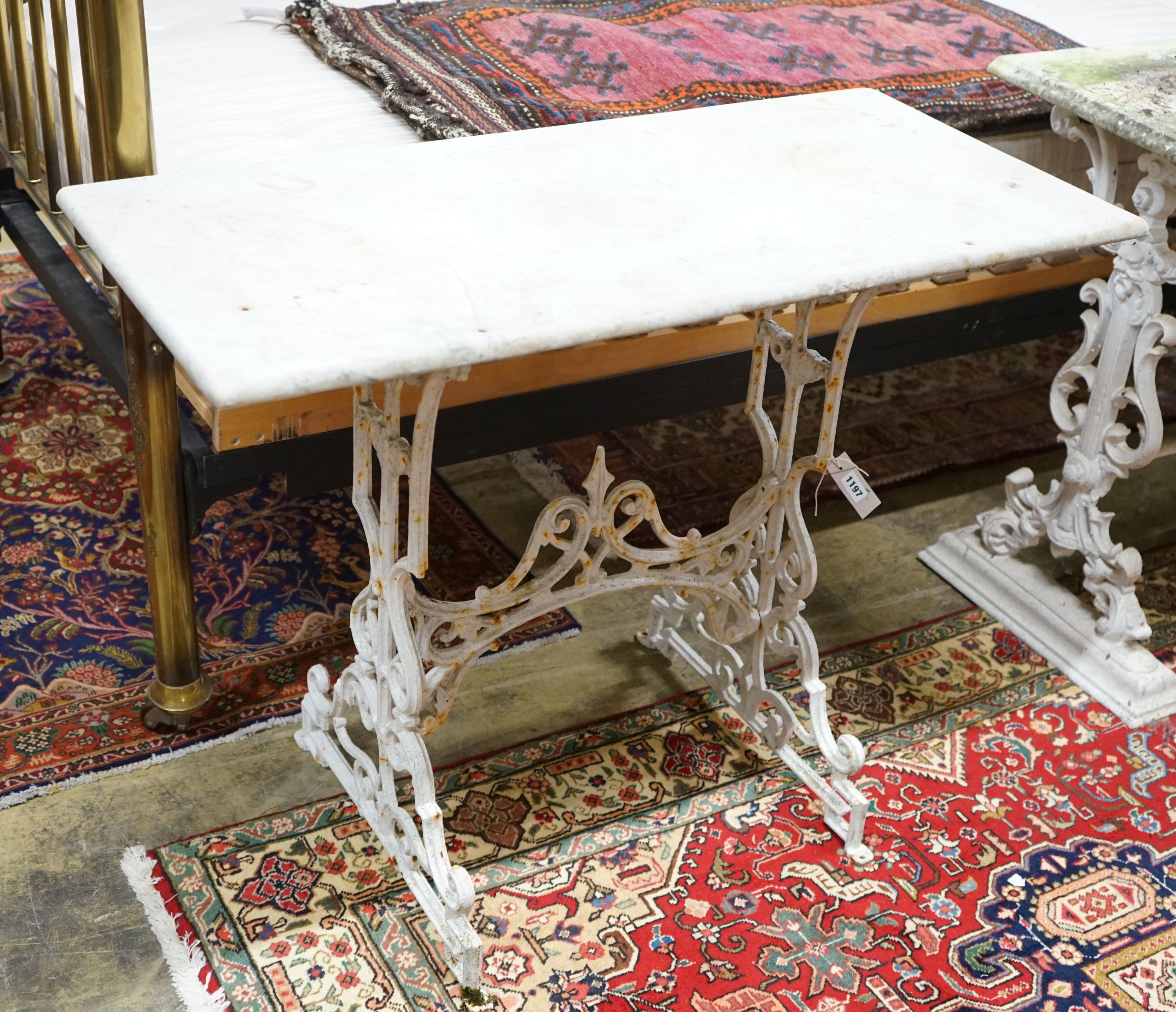 A Victorian cast iron rectangular marble topped garden table, width 97cm, depth 46cm, height 75cm